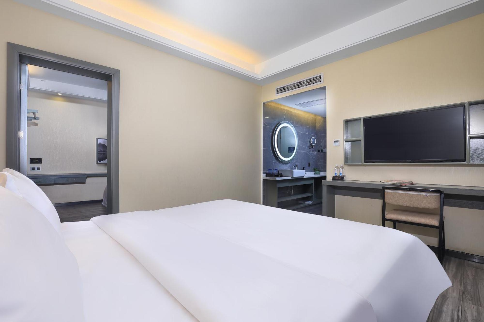 Wing Hotel Guilin - Central Square Quarto foto