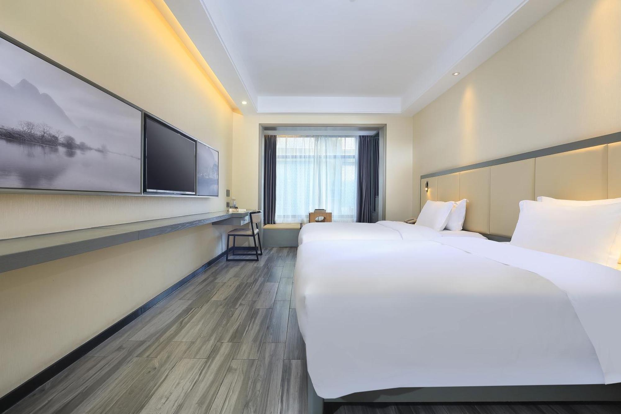 Wing Hotel Guilin - Central Square Quarto foto